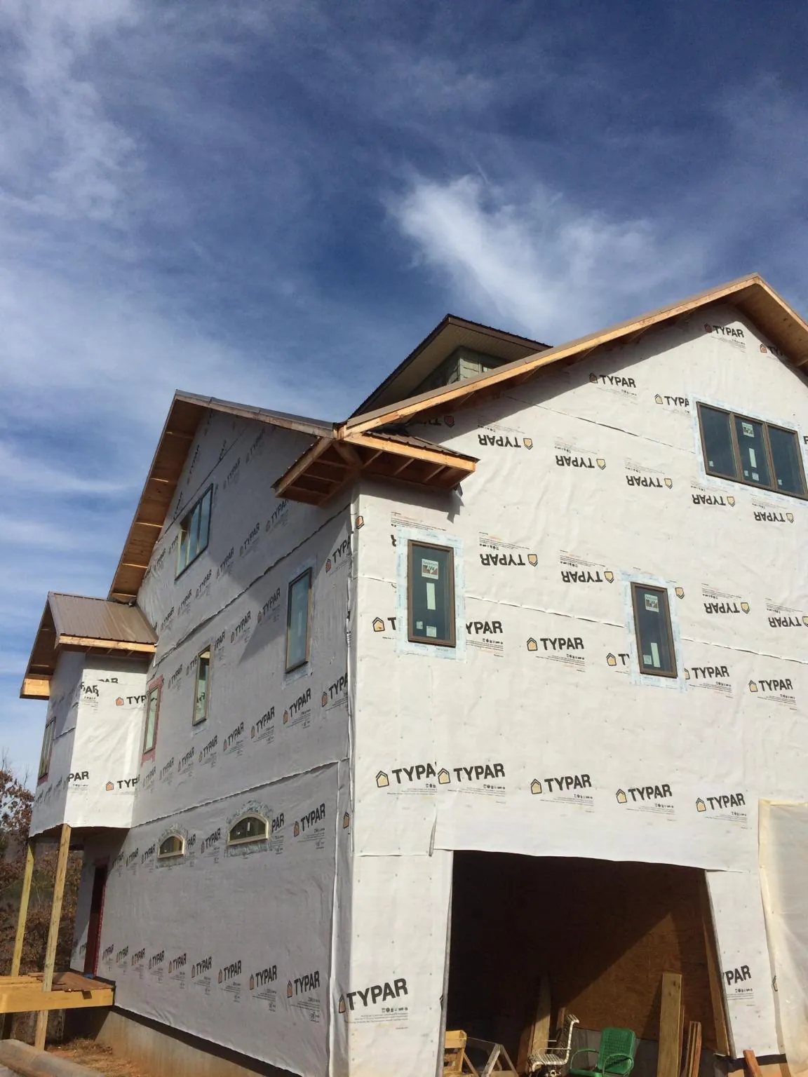 Stick built house wrapped in Typar with new roof framing and dormers in Myersville